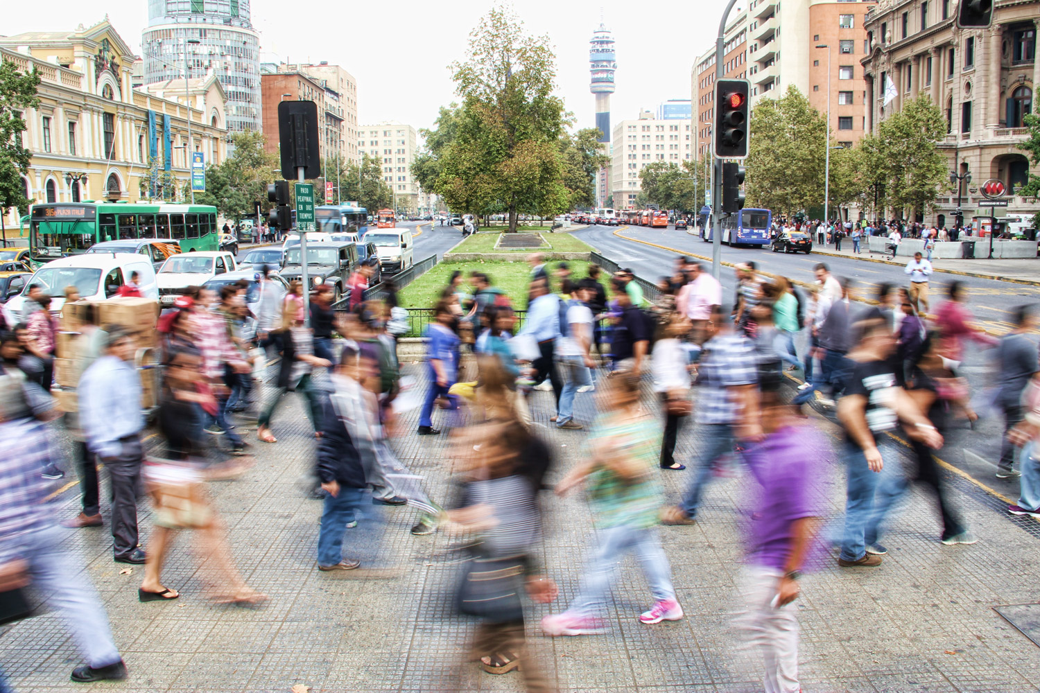 People crossing a busy street