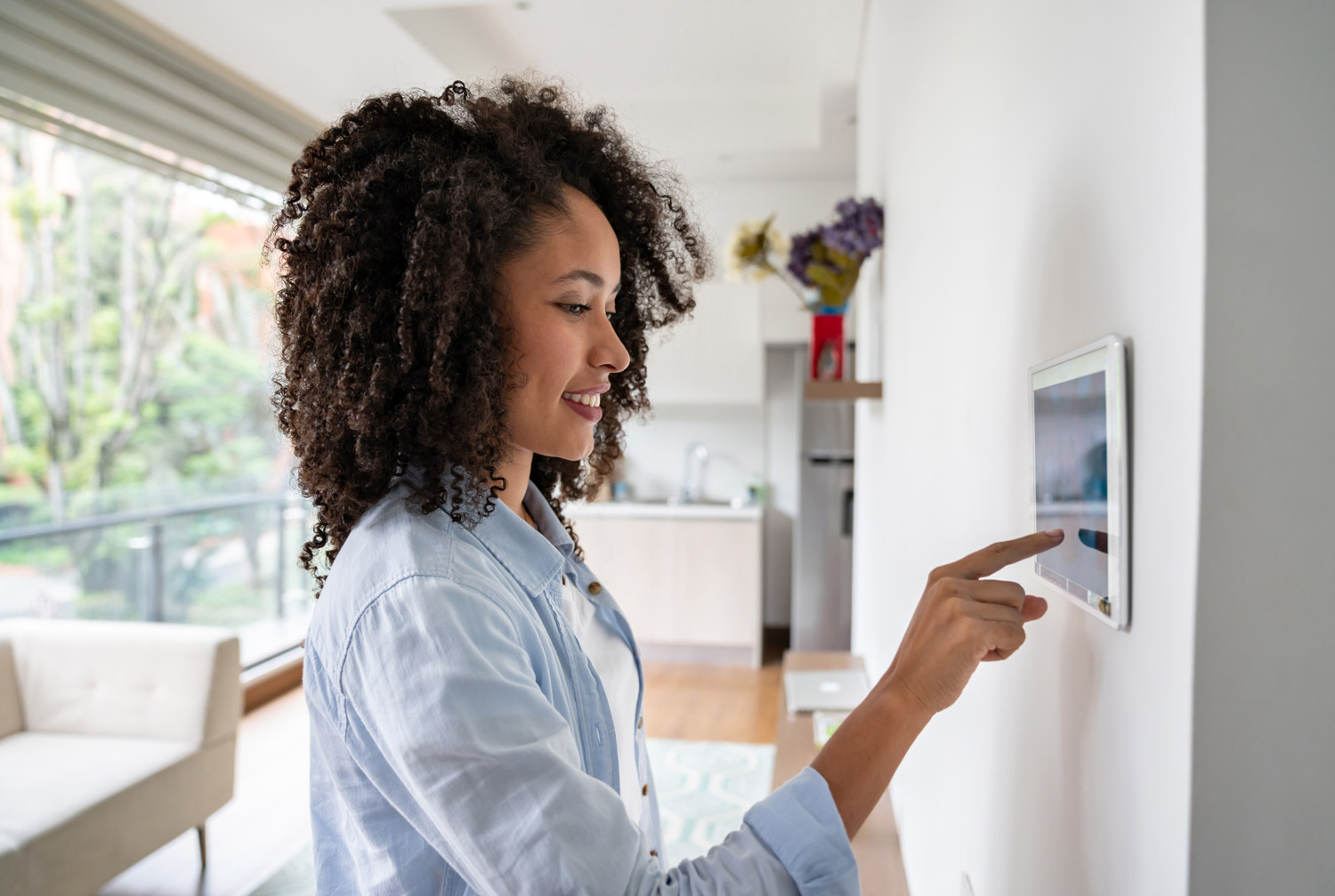 Person using a smart home touch display