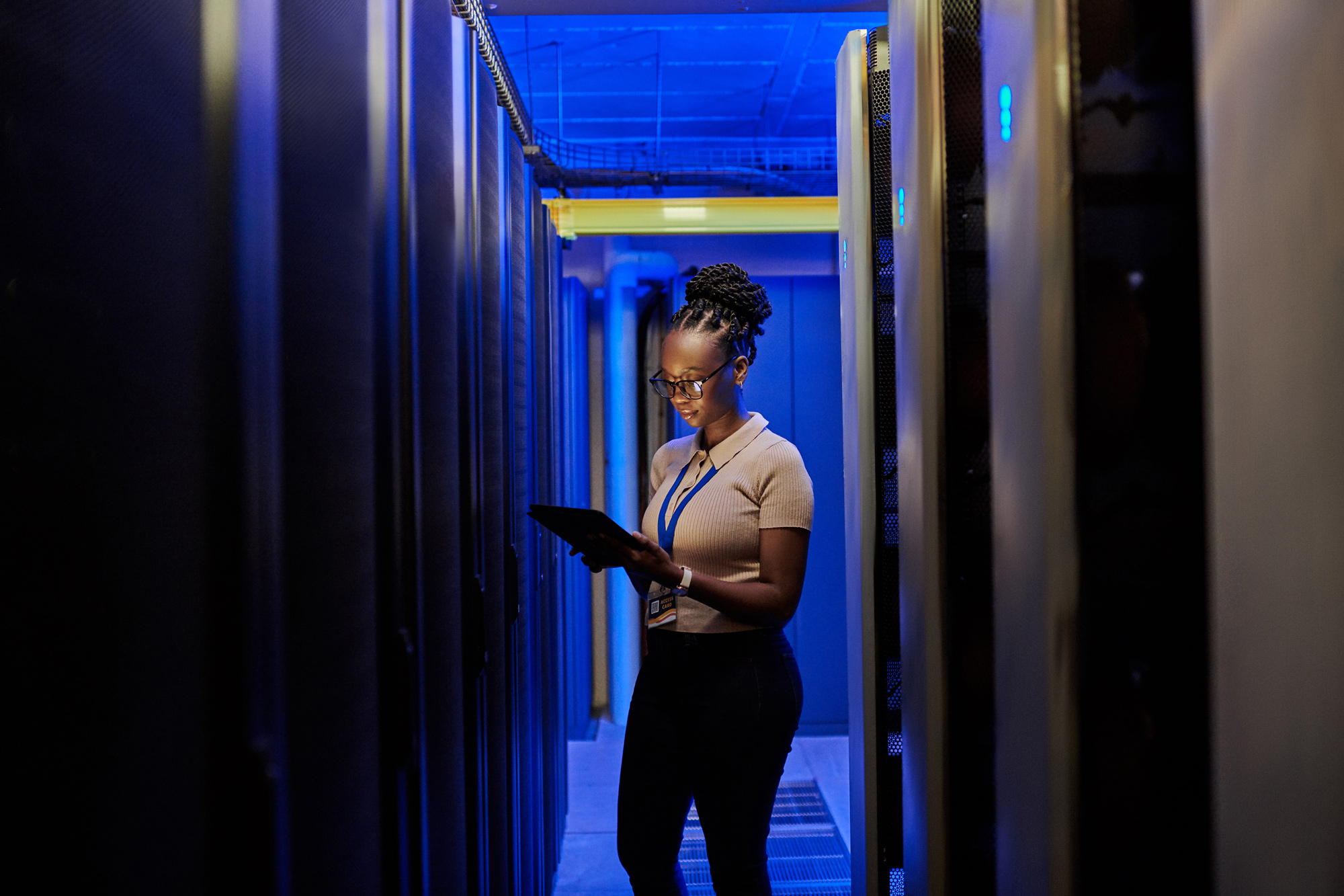 Engineer working in a server room